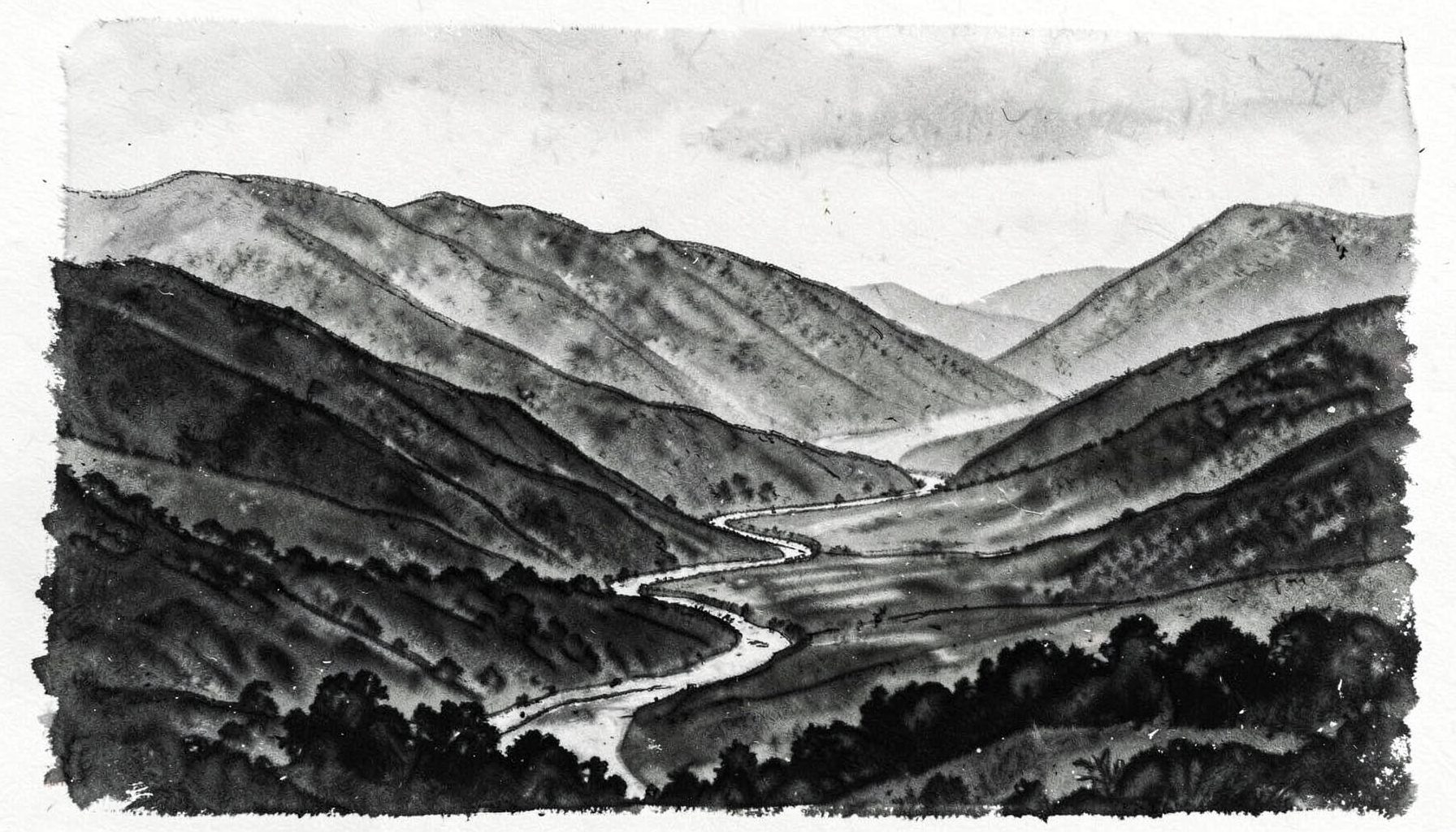 A sweeping charcoal-toned landscape of layered mountain ridges fading into mist, with a lone winding river cutting through a broad valley beneath a muted sky.