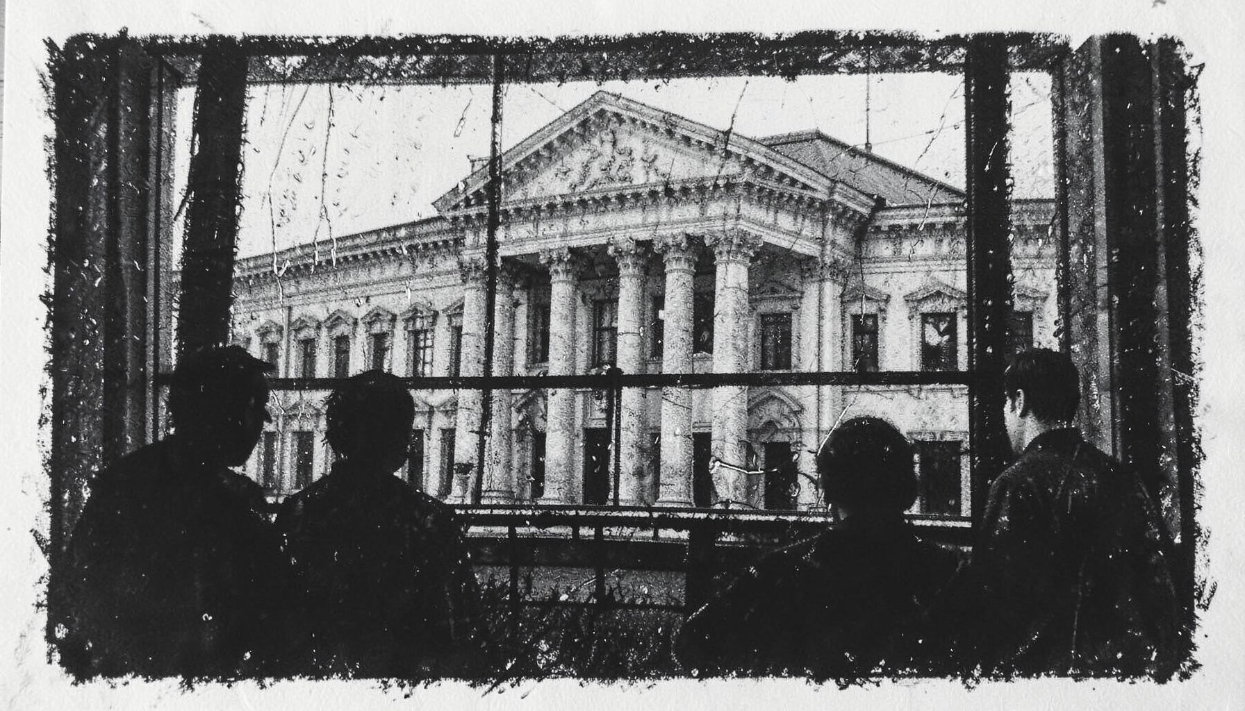 A bold charcoal drawing of a government building facade seen through a rain-streaked window, with shadowy figures in the foreground, rendered in heavy dark lines and soft grey tones.